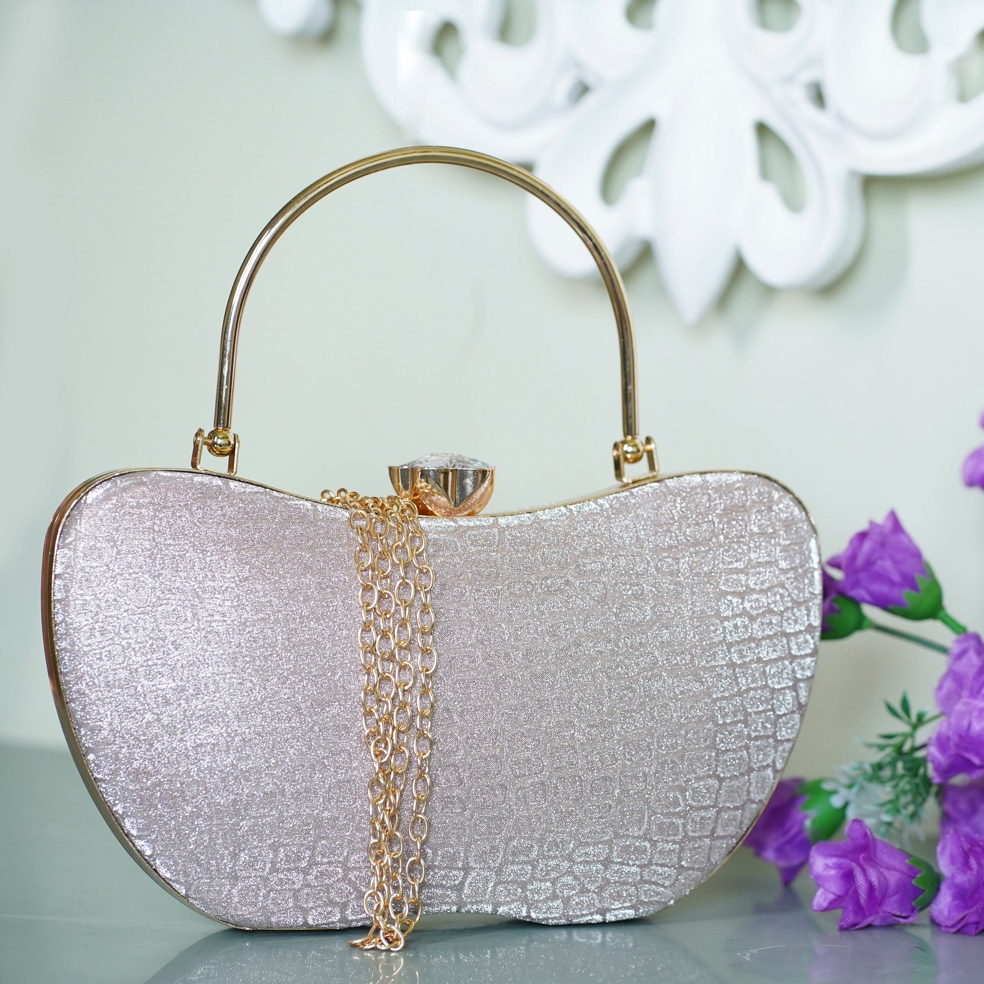 designer rose gold clutch bag