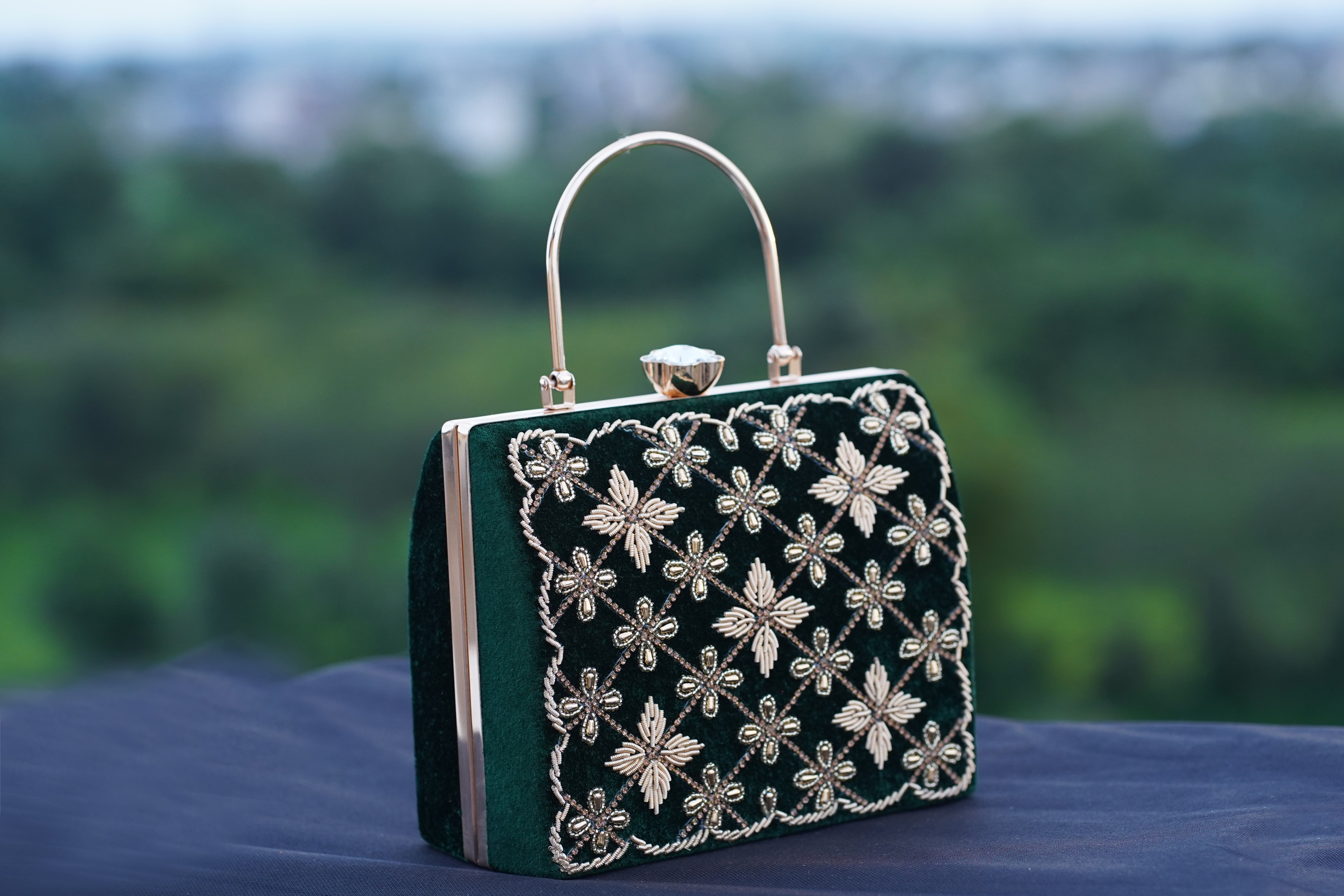 Explore the elegance of large designer clutch bags at Anandi Creations