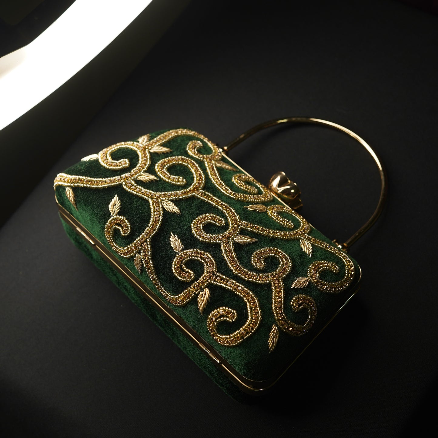 green designer clutch bag